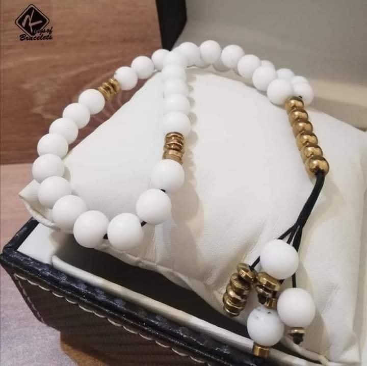 سبحة بيضاء مطفية بفواصل ذهبية راقية